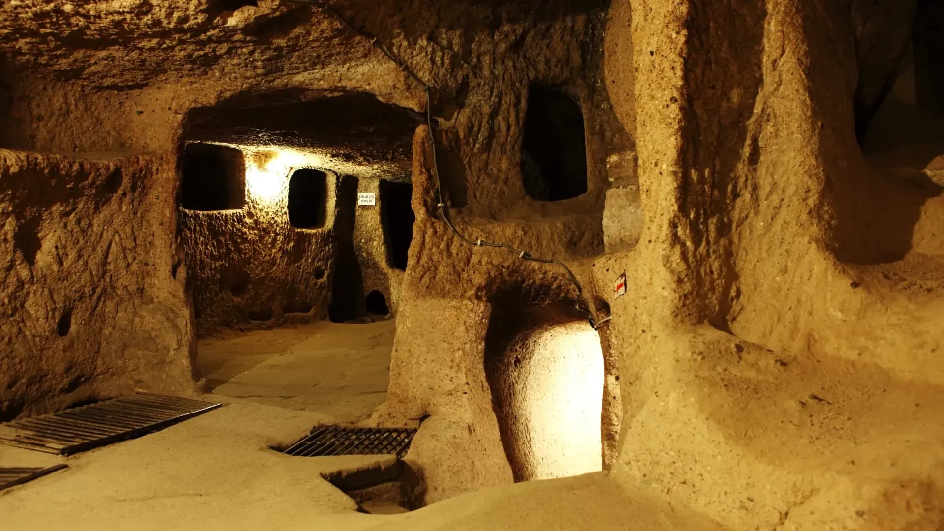 Rock-cut room with a circular stone door