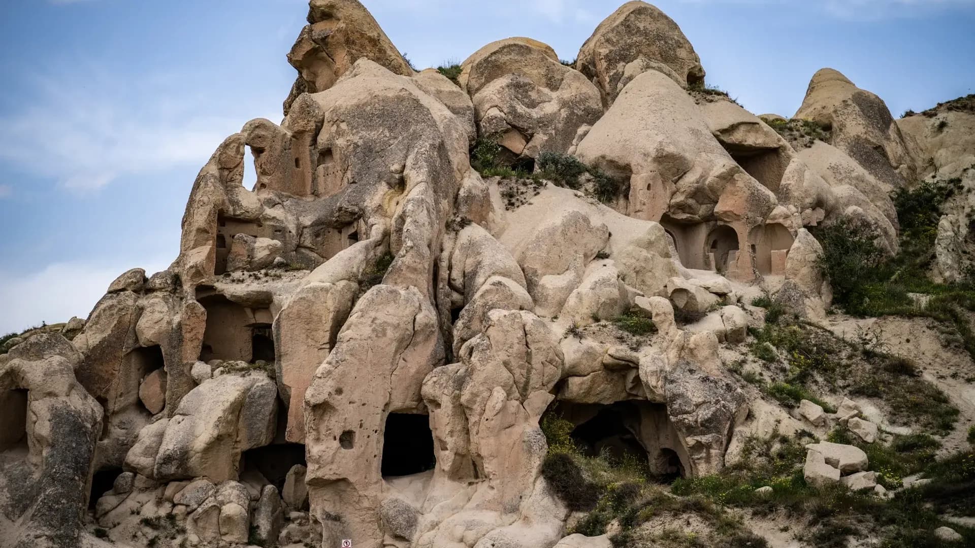 Rock formation with carved openings
