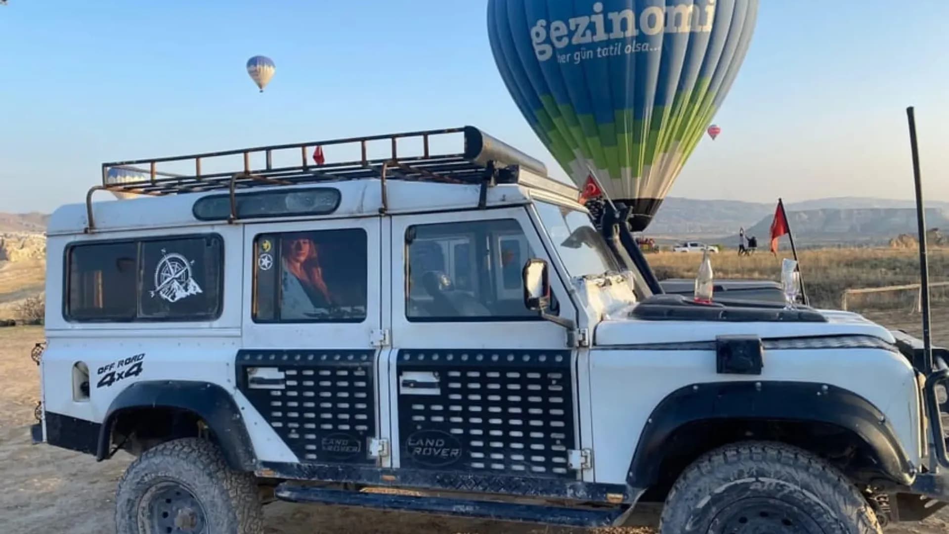 Off-road vehicle with a balloon behind