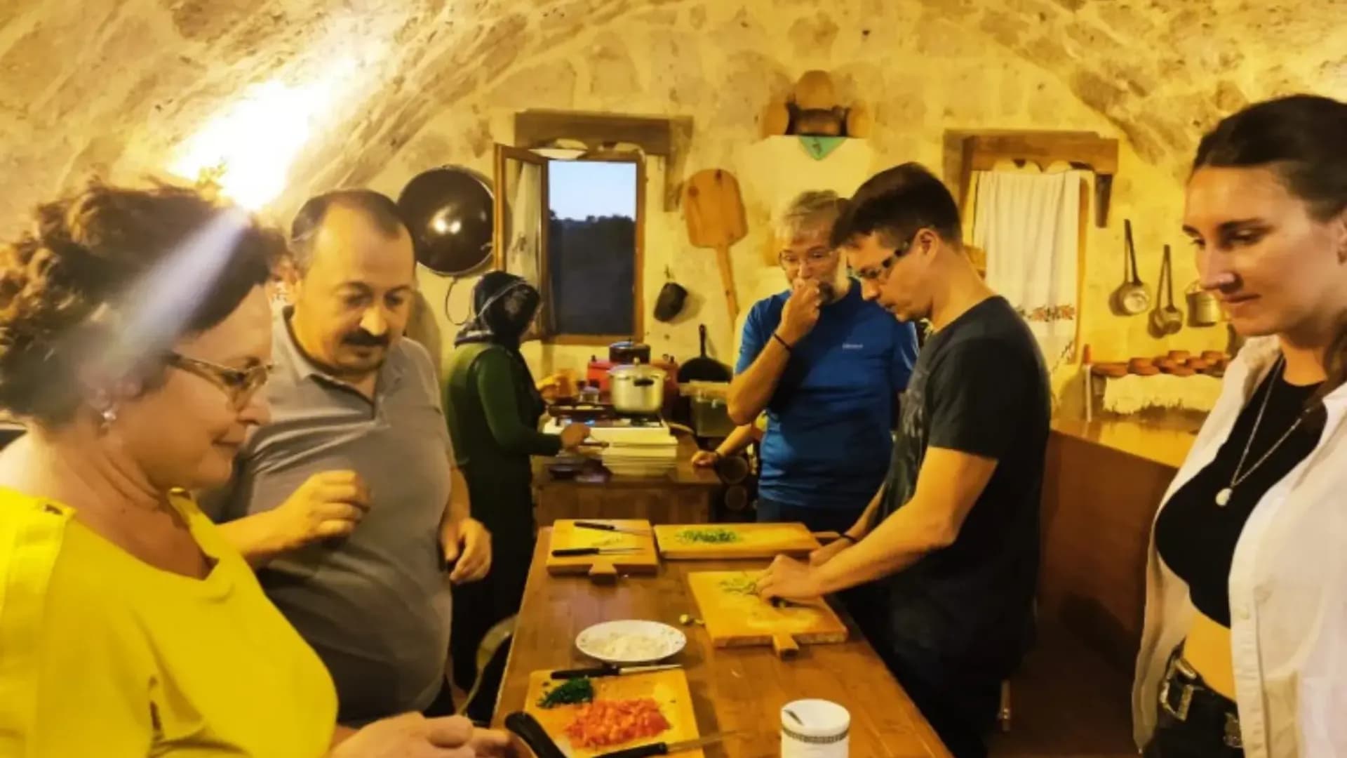 People cooking together indoors