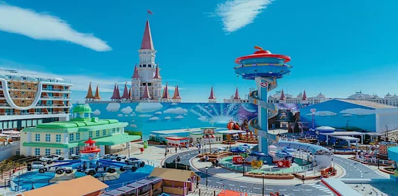 Colourful amusement rides and themed buildings