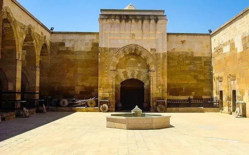 Stone courtyard and entrance arch
